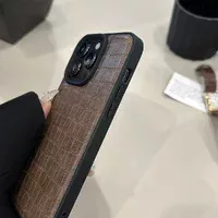 Кожаный чехол "Crocodile Pattern" для Apple iPhone 15 Pro Коричневый